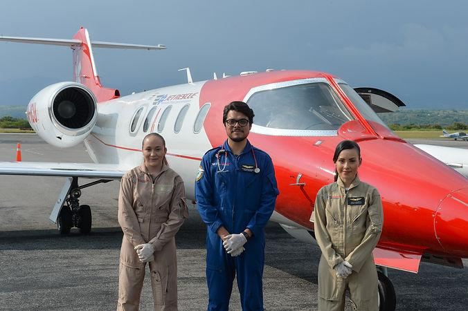 Certified Aeromedical Specialists in front of Chartered Ambulance Jet
